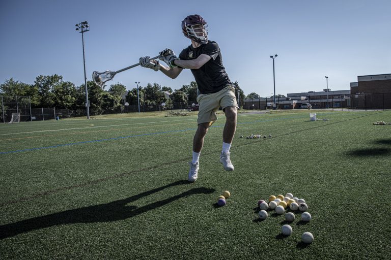 Norwich lacrosse player, John (Sam) Markle, Alexandria, Va.  He is going into the second year. He practices at home but since he broke several nets from continual practice, he uses the nets at his former high school or at West Potomac High School.  The outdoor field images were taken at West Potomac